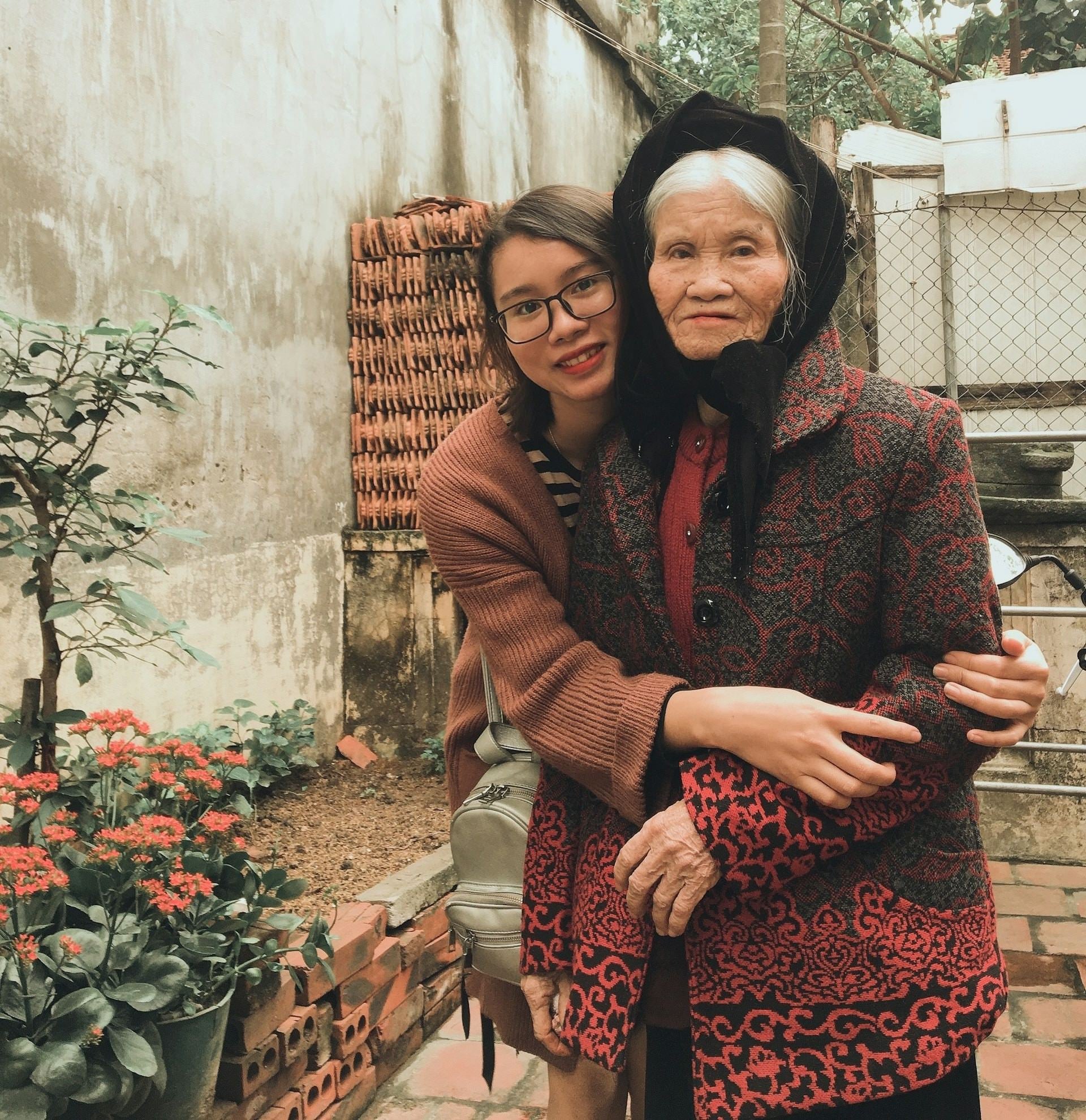 Adult mother and daughter smiling