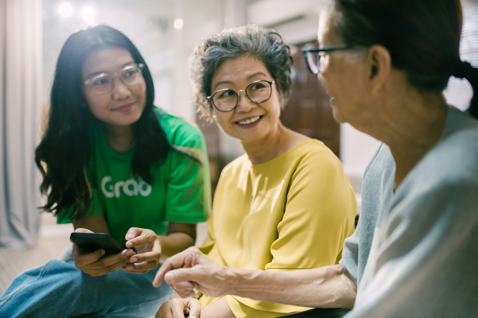 Photo by <a href="https://unsplash.com/@grab?utm_source=unsplash&utm_medium=referral&utm_content=creditCopyText">Grab</a> on <a href="https://unsplash.com/photos/a-group-of-women-sitting-on-the-floor-looking-at-a-cell-phone-YV5KSyxM1qQ?utm_source=unsplash&utm_medium=referral&utm_content=creditCopyText">Unsplash</a>